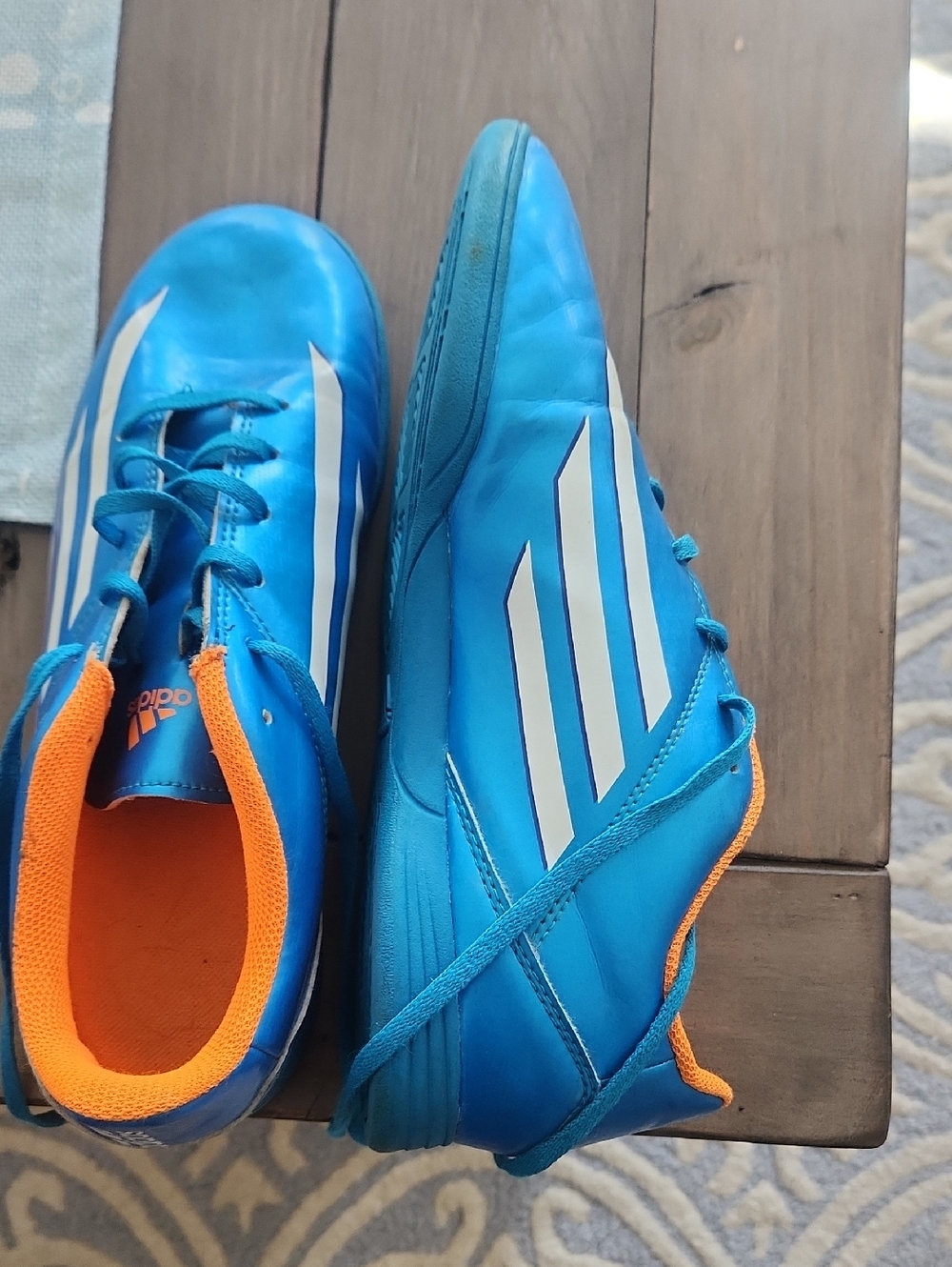 Kids Blue and Orange Athletic Cleats